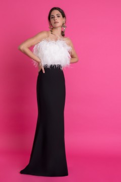 Long black and white ball gown with a plunging neckline with beautiful and delicate feathers around the neckline.
